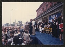 ["Caption: DKI at Joe Biden's presidential announcement at Wilmington. July 1987. Photo from Wm. Montgomery."]