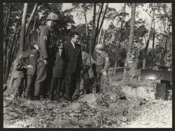 ["Caption: Ground surveillance -- S/Sgt Theodore F. Marlowe, 2/87 Ground Surveillance Section Leader, describes the Army's TPS-33 medium range radar set to Senator Inouye. Behind is Maj Gen Stanley R. Larsen, 8th Div Commander and the Senator's party."]