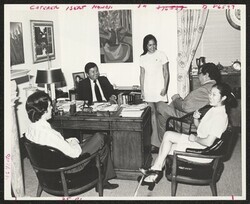 ["Caption: Senator Inouye finds time to chat with members of his Washington, D.C., staff: (l-r) Dick Rust, Senator Inouye, Lamela Holt, Henry Kuualoha Giugni, and Laurine Miura"]
