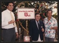 ["Information in title from back of photo. Caption: The Salvation Army 1985 Christmas Kettle Drive. Celebrity Bell Ringers. Stamp: Owen and Owen, Photographers."]