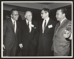 ["Caption: Senator Daniel K. Inouye of Hawaii, right, makes a point in a discussion at a \"Meet-Your-Congressmen\" Conference of engineers in private practice in Washington, D.C., sponsored by Consulting Engineers Council of the United States. From left, are"]
