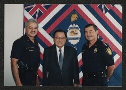 ["Caption: Deputy Chief Michael Carvalho, Chief Lee Donohue 7-1-98."]