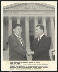 ["Caption: From the office of Senator Daniel K. Inouye, April 25, 1963: Senator Daniel K. Inouye congratulates Deputy Attorney General Ken Saruwatari of Honolulu following his recent admission to practice before the United States Supreme Court. Supreme Cour"]
