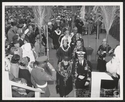 ["Caption: Launching ceremony. Champagne walk led by Mrs. Samuel Wilder King, sponsor, and RADM Edward J. Fahy, USN, Mare Island Naval Shipyard. 16 January 1965. U.S. Navy Official Photograph."]