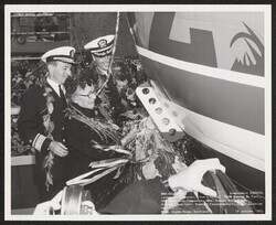 ["Caption: Launching ceremony. Christening. RADM Edward J. Fahy, USN, Shipyard Commander; Mrs. Samuel Wilder King, Sponsor; and Capt. Norbert Frankenberger, USN, Launching Officer. Mare Island Naval Shipyard. 16 January 1965. U.S. Navy Official Photograph."]