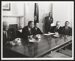 ["Caption: Cable - Submarine Japan-Hawaii. Opening ceremonies of the Transpacific Cable, Washington. At left: Comm. Hyde of F.C.C. Eugene McNeely, ATT Pres., on phone. 6/18/64. Stamp: American Telephone and Telegraph Company."]