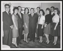 ["Caption: 1963 1st Senate term: Tom Ige?, Sue Brandon, Jack Teehan, Lamela Holt, Senator Daniel K. Inouye, Dr. Ralph Miwa, Kimie Ishibashi, ---, Henry Giugni, ---."]