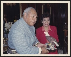 ["Information in title from back of photo: 1988. King Tāufaʻāhau of Tonga, 70th birthday. Sent by President Reagan as official representative. Gift of \"eagle\" from the President."]