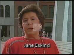 ["The political advertisement warns of a new threat in Washington, specifically the discussion about cutting Social Security as part of federal deficit reduction efforts. It urges voters to protect Social Security by supporting Jane Eskin for Congress in the upcoming election on December 3."]