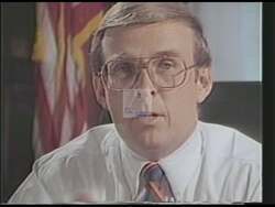 ["In the 1988 campaign ad for Byron Leslie Dorgan, various scenes highlight his critique of Wall Street's excesses and his commitment to economic reform. The ad shows executives and traders in corporate settings contrasted with clips of Dorgan passionately advocating for Main Street in speeches to Congress and assemblies. His focus is on legislative victories aimed at curbing corporate greed and championing economic policies beneficial to average Americans."]
