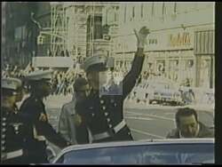 ["Kevin Hermening's 1988 political TV ad highlights his military service, patriotism, and dedication. It features various scenes of him in uniform, amidst flags, and addressing supporters, projecting an image of resilience, integrity, and leadership. Each frame aims to solidify his commitment to public service and readiness for Congress."]