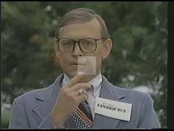 ["The 1988 political TV ad for John Ripin Miller portrays his opponent, Reese Lindquist, as perplexed and inconsistent in various political scenarios. In stark contrast, Miller is shown as a figure of decisiveness, consistency, and effective leadership, emphasizing his ability to provide stable and reliable governance amidst political chaos."]