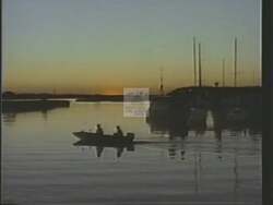 ["In a 1988 campaign ad, Democratic candidate James Randolph Olin emphasizes his dedication to environmental preservation by standing before Virginia's picturesque Blue Ridge Mountains at sunset. Through repeated scenic imagery, the ad visually aligns Olin with his commitment to conserving Virginia's natural beauty, projecting a strong message of environmental advocacy and pride in state heritage."]