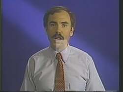 ["In his 1988 campaign ad, Democratic candidate Robert Ellsworth Wise stressed the importance of community assistance and accessibility through his mobile office initiative. Repeatedly shown standing beside a \"Mobile Office\" sign, Wise emphasized his commitment to enhancing constituent services and problem-solving across multiple counties, promoting governmental aid and support."]