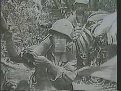 ["In the 1988 political TV ad for Democratic Party candidate Tim Johnson, poignant and solemn scenes pay tribute to Vietnam War veterans. Featuring heartfelt reunions, veterans gathering at commemorative settings, and displays of memorabilia and photos, the ad portrays Congressman Johnson advocating passionately to keep veterans' support centers open. It emphasizes the ongoing struggles and sacrifices of veterans."]