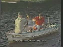 ["The 1988 political TV ad for Democratic candidate Dave Obey prominently features tranquil scenes of a serene Wisconsin lake surrounded by lush greenery, emphasizing his commitment to environmental preservation. Throughout the ad, Obey appears beside the iconic lake, aligning himself with ecological conservation efforts to appeal to voters' appreciation of natural beauty and heritage."]