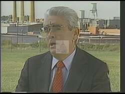 ["In his 1988 campaign ad, Tom Gilmore, a Democratic Party candidate, speaks confidently and passionately about addressing economic disparities and revitalizing the Piedmont area. Positioned in various settings, from campaign rallies to professional offices, Gilmore emphasizes his commitment to economic fairness and prosperity for the local community, surrounded by campaign imagery that reinforces his message of dedication and action."]