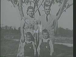 ["In his 1988 TV campaign ad, Democratic candidate Mike Parker depicts himself as a relatable leader with humble beginnings. He passionately addresses economic and national challenges across various settings, including churches and community halls, to evoke confidence and hope among voters. Parker���������s consistent, heartfelt message highlights grassroots leadership and economic solutions."]