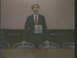 ["The 1988 political ad for Democratic Party candidate Robert Ellsworth Wise features a series of scenes depicting an empty conference table with chairs, repetitively symbolizing the palpable absence and urgent need for collaborative leadership and unity among West Virginia's leaders to address state issues effectively. The recurring empty setting emphasizes the call for forming a leadership council to tackle unmet potential in problem-solving collaboratively."]