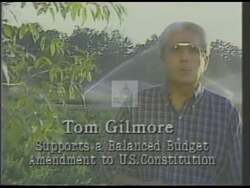 ["The 1988 political ad for Thomas Odell Gilmore prominently features him in various lush forest settings, emphasizing his commitment to environmental sustainability and educational initiatives. Gilmore speaks confidently about his legislative accomplishments and future policies, symbolizing growth and dedication to nurturing future generations through thoughtful leadership and firm commitment to progress."]