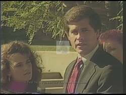 ["The 1988 presidential campaign ad for Dennis E. Eckart showcases his fervent advocacy for aggressive anti-drug policies and military intervention. In various scenes, Eckart speaks passionately from podiums, at Congress, and in his office about intensifying America's war on drugs through stringent laws and strategies. His determination to address the drug crisis is emphasized throughout the ad."]