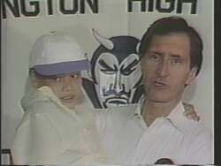 ["The 1988 political TV ad for Robert J. Mrazek centers around a young man's heartfelt reception by Huntington High School students, emphasizing their role in helping him arrive in the U.S. The ad showcases various speakers and scenes of students celebrating this achievement, highlighting the positive impact and empowerment fostered by these community actions."]