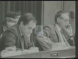 ["In the 1988 campaign ad, Democratic candidate Bob Torricelli confidently addresses the nation, standing amidst American flags and supportive crowds. He portrays strong leadership and dedication to American values, emphasizing his commitment to progress in education and environmental reforms. The ad visually underscores his patriotism and readiness to lead the country."]