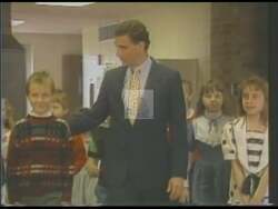 ["In a 1990 political TV ad, Republican candidate Rick Hawks presents himself as a poised and competent congressional hopeful. He emphasizes his effective leadership, especially in education and drug rehabilitation. Hawks highlights his impressive track record and asserts his dedication to community service and improvement, speaking confidently from various podiums to engaged audiences."]