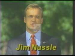["In the 1990 presidential campaign ad, Republican candidate Jim Nussel emphasized integrity, principled leadership, and local support. With scenes of Nussel speaking earnestly to the camera, at podiums, and during debates with patriotic backdrops, the ad underscores his commitment to fairness and contrasts his campaign funding sources with his opponent's."]