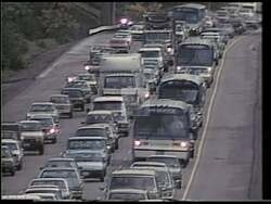 ["In the 1990 election ad, the Republican Party targeted Cynthia Sullivan, criticizing her management of Seattle's urban development and challenging her congressional qualifications. Various scenes showed her in debates and ads, depicted both defending and promoting her record amidst visuals of Seattle, with overlays critiquing her performance and aspirations."]