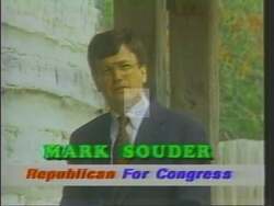 ["In his 1994 presidential campaign ad, Republican Mark Edward Souder emphasizes a strong preference for reduced government influence and increased local control. Presenting himself as deeply concerned about America's future, Souder is portrayed as an earnest, suburban-rooted candidate who speaks directly to the viewer against a backdrop of American flags, advocating for local solutions over centralized governmental control in various energetic rally and personal address scenes."]