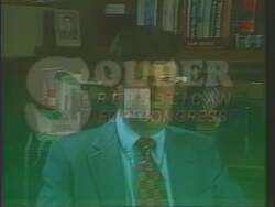 ["In his 1994 presidential campaign ad, Republican Mark Edward Souder critically evaluates crime reduction strategies. Positioned at a podium, he expresses skepticism about the effectiveness of merely increasing police numbers and building more jails. Through repeated scenes, Souder emphasizes that these measures alone will not solve crime issues, advocating for broader and more effective solutions."]