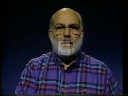 ["In the 1994 presidential campaign ad, Libertarian Party candidate Barrie Konicov emphasizes constitutional rights and the need for integrity in government. Throughout various scenes, Konicov passionately speaks at a podium, often backed by American flags and banners advocating \"Constitutional Rights First\" and \"Defend the Constitution,\" urging leadership change and adherence to constitutional values."]