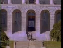 ["In the 1994 presidential campaign ad, Republican Rick Bennett emphatically promotes government reform and accountability. Throughout various scenes, Bennett, appearing confident and determined, addresses diverse crowds from podiums, advocating for transparency, fiscal responsibility, and leadership in government reform, with consistent backdrops of American flags and \"Vote Bennett\" signs enhancing his patriotic appeal."]