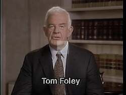 ["In the 1994 presidential campaign ad, Democratic candidate Thomas S. Foley passionately critiques his opponent's preference for tax policies favoring the wealthy. Throughout the ad, Foley advocates for tax fairness and the need to support the middle class over the elite. Scenes show Foley debating and defending middle-class benefits on a debate stage, emphasizing equitable tax contributions and financial support measures. The ad underscores Foley's commitment to middle-class Americans against the backdrop of a heated debate."]
