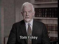 ["In his 1994 campaign ad, Democratic Party candidate Thomas S. Foley discusses the difficult decisions he faced regarding gun control legislation. Throughout the ad, Foley appears earnest and is shown engaging with the issue in various settings, including a campaign event and a boardroom, emphasizing the impact of his decisions on public safety and his career."]