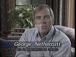 ["In his 1994 political TV ad, Republican George R. Nethercutt Jr. confidently addresses the camera, presenting himself as a stark contrast to incumbent Tom Foley. Nethercutt advocates for term limits and criticizes government-run healthcare, positioning himself as a candidate for change and accountability in Congress."]
