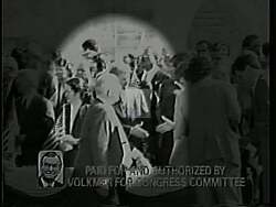 ["In a 1994 campaign ad, Democratic candidate Harold Lee Volkmer targets opponent Kenny Holzhoff, depicting him repeatedly signing contracts that prioritize wealthy interests at the expense of public services. Multiple scenes emphasize Holzhoff���������s alignment with detrimental policies that slash essential social programs, including Social Security, Medicare, and public education, while favoring tax cuts for the wealthy and increased defense spending. The ad aims to portray Holzhoff as a candidate whose policies could harm the community���������s welfare."]