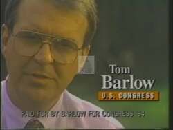 ["In a 1994 political TV ad, Democratic Party candidate Tom Barlow earnestly addresses the nation from his desk, promoting legislative reforms focused on stronger law enforcement and the enhancement of traditional values. Barlow portrays himself as a devoted advocate intent on serious societal issues, advocating consistently for tougher laws and moral education in speech after speech throughout the campaign's media efforts."]