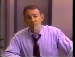 ["In a 1994 political TV ad, Republican John Greg Ganske, both a surgeon and congressman, speaks intensely from an Iowa hospital setting. Dressed in surgical attire, he addresses the adverse impacts of crime and advocates for stricter criminal laws. Throughout the ad, Ganske highlights his medical background while pledging to enforce tougher policies to enhance community safety and improve emergency healthcare in response to crime."]