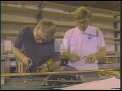 ["In the 1994 political TV ad, Rick Bennett passionately advocates for job preservation and government reform in Maine. He emphasizes the need for business-friendly policies and local jobs security, speaking at various podiums and visiting factories. Bennett confidently addresses audiences, advocating for sustainable economic policies to support Mainers."]