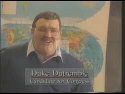 ["The 1994 presidential campaign ad for Democratic candidate Duke Dutremble prominently features him engaging with vibrant, diverse classroom environments. Through a joyful and enthusiastic demeanor, Dutremble is portrayed interacting with students of various backgrounds, symbolizing his commitment and dedication to an inclusive and hopeful educational agenda."]