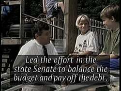 ["The 1994 political TV ad for Republican Party candidate John Carroll prominently contrasts his fiscal responsibility with Congressman Sanders' record on government spending. The ad showcases Carroll as a balanced budget advocate, juxtaposing scenes of him with visuals and statistics depicting Sanders as fiscally irresponsible. The ad targets voters who value economic conservatism."]