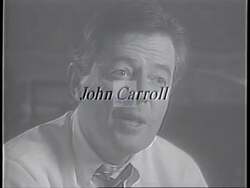 ["In the 1994 political TV ad, Republican candidate John Carroll contrasts his problem-solving approach with Bernie Sanders' complaint-based politics. Several scenes depict Carroll and Sanders in differing settings, portraying Carroll as action-oriented. Carroll emphasizes bipartisan solutions and pragmatic actions over mere complaints, seeking to appeal to voters by highlighting a proactive political stance."]