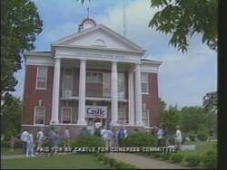 ["In the 1994 presidential campaign ad, Democratic candidate Guthrie Castle, surrounded by lush Tennessee scenery and American flags, emphasizes his deep commitment to family values, civic unity, and integrity. With a confident and approachable demeanor, he speaks passionately to crowds, both large and intimate, ensuring traditional yet progressive values are at the forefront of his platform, appealing broadly across community lines."]