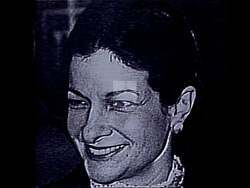 ["In the 1988 political ad from Ken Hayes' campaign, scenes contrast Olympia Snowe, shown in glamorous magazine shoots, with everyday Mainers, questioning her contributions to local constituents. The ad portrays Snowe as disconnected from the struggles of ordinary Maine citizens, emphasizing Hayes as a candidate more in tune with local issues."]