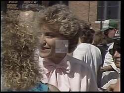 ["In her 1988 campaign ad, Marcy Kaptur focuses on the resilience and progress of Northwest Ohio. She passionately addresses constituents, emphasizing their hard work and commitment to education and job training. Throughout the ad, scenes of Kaptur speaking to inspired crowds are set against backgrounds featuring the American flag and Ohio imagery, symbolizing regional pride and national identity."]