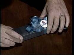 ["In the 1988 political TV ad for Republican Paul Eugene Gillmor, repetitive imagery is used to reinforce his commitment to fiscal responsibility. Senator Gillmor is consistently shown holding a long, yellow pencil, which symbolizes his focus on budget control, fiscal precision, and his capability to enforce budget cuts and line item vetoes."]