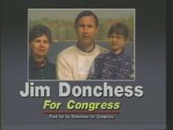 ["In the 1988 political TV ad, Democratic candidate Jim Donchess speaks earnestly to the camera about his commitment to education and public safety. Situated in a cozy room with campaign posters, Donchess passionately discusses his record and future plans, focusing on improving family life, schools, and community safety, exemplified by the backdrop of American flags and attentive voters."]