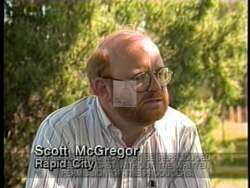 ["In his 1992 presidential campaign ad, Democratic candidate Tim Johnson is portrayed as a trustworthy and sincere leader. Scenes include Johnson confidently addressing constituents at a town hall and speaking passionately in Congress. The ad emphasizes his integrity, dedication, and strong advocacy, portraying him as deeply committed to his political duties."]